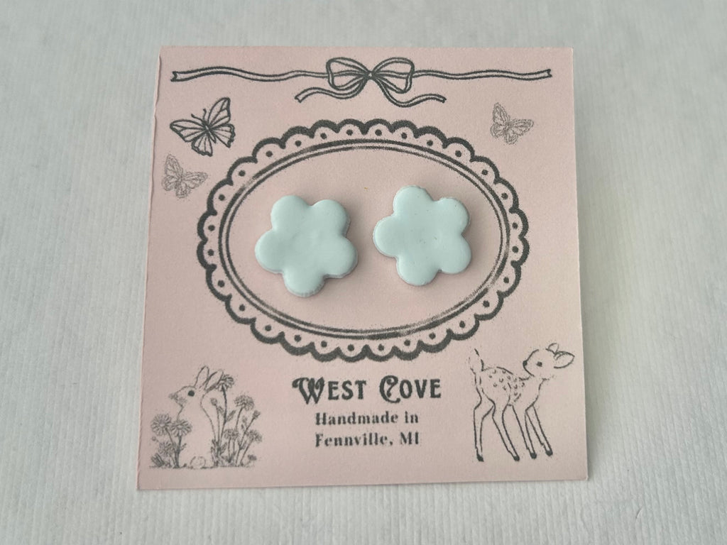 Light blue daisy polymer clay earrings, 0.5 in, hypoallergenic stainless steel backings, handmade in Fennville, MI