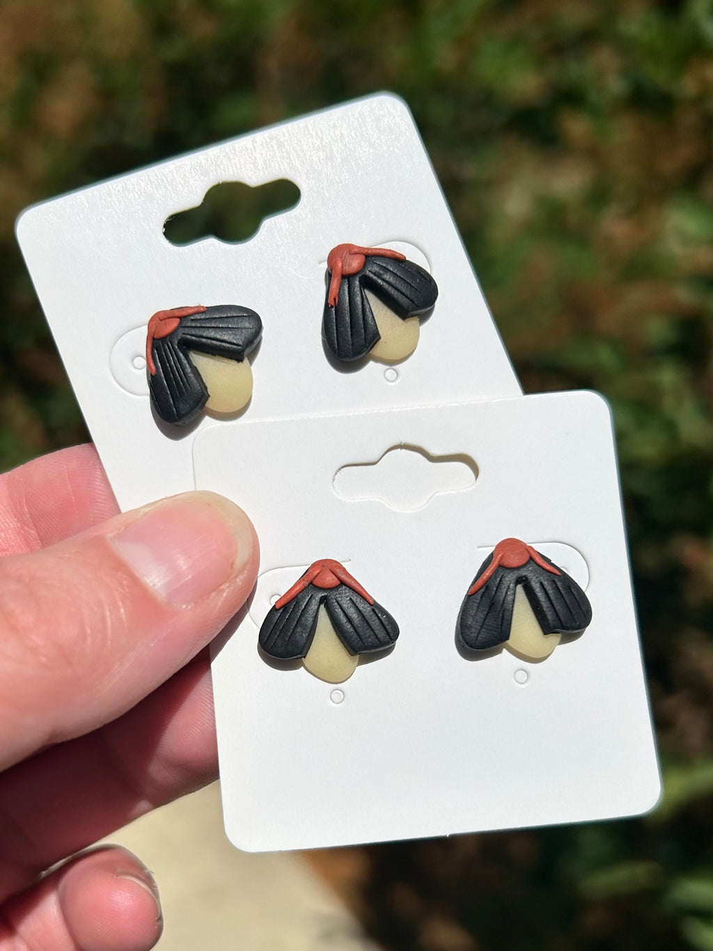 Glow in the dark firefly earrings polymer clay handmade by West Cove