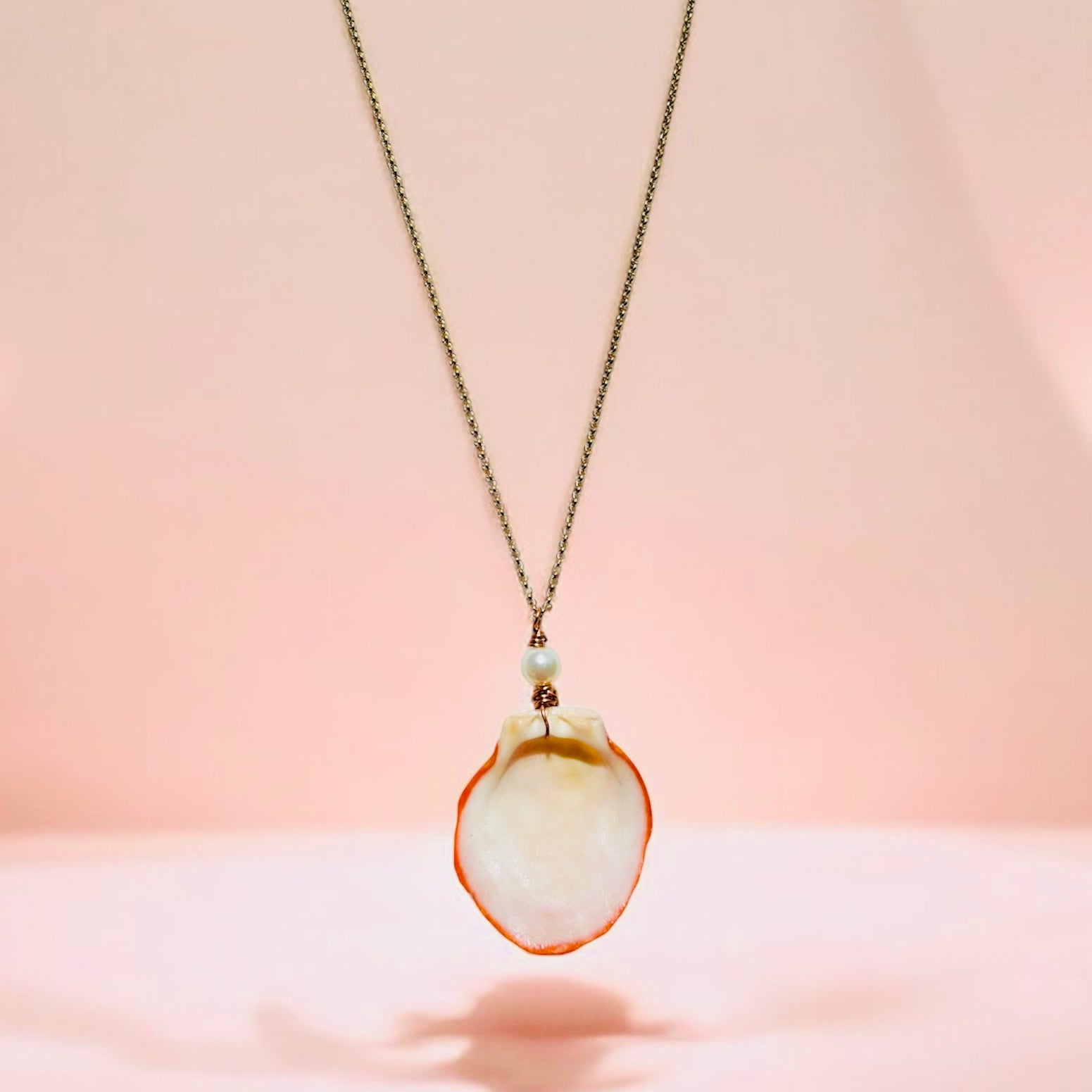 Ancient Sun & Sea – Handcrafted Lion’s Paw Shell & Freshwater Pearl Statement Necklace by West Cove
