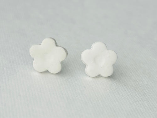 White daisy flower polymer clay earrings with hypoallergenic stainless steel backs, handmade in Michigan.
