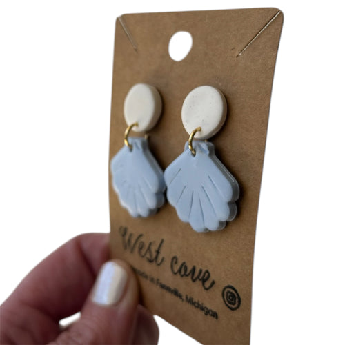 Blue polymer clay sea shell dangle earrings with white round studs, coastal beachy style.