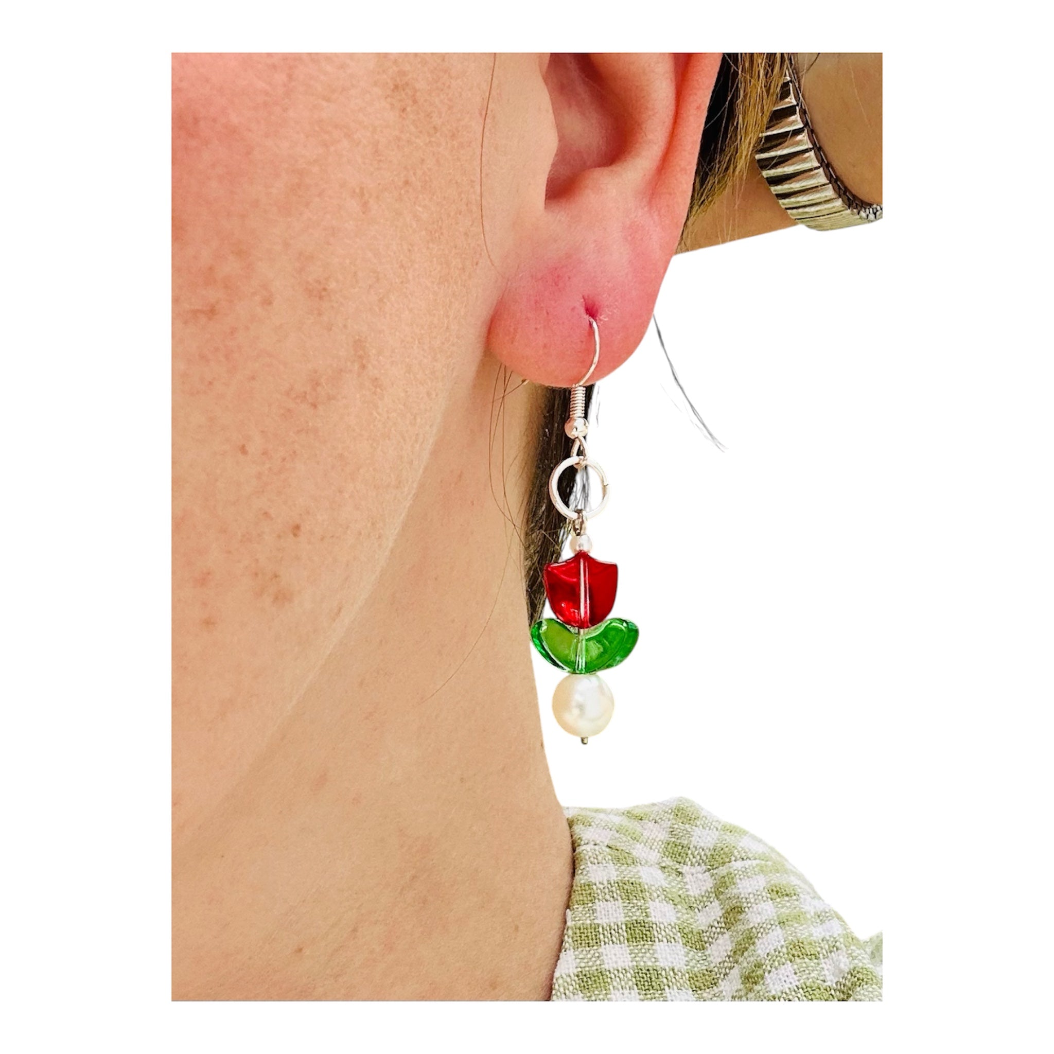 Beaded tulip earrings on sterling silver hooks with red and green petals.